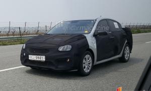 Фотошпионы поймали новый Kia Rio в камуфляже